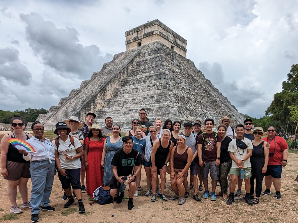 Saint Mary's travelers in Mexico with pyramid